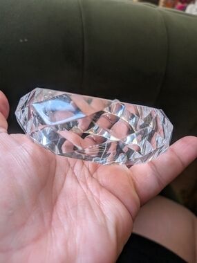clear faceted Lucite bangle bracelet featuring a chunky design.